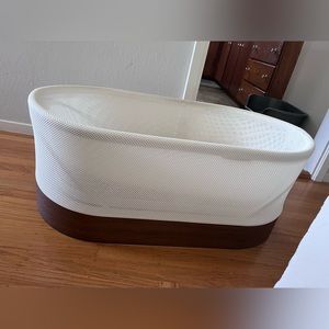 Snoo with sheets and swaddles